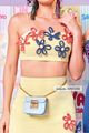 conjunto-de-mini-saia-e-top-com-flores-amarelo-46-391091-0